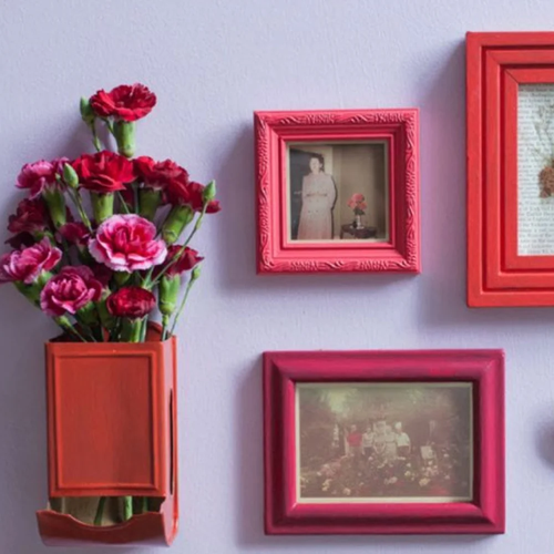 Photo frames on wall | Assured Flooring